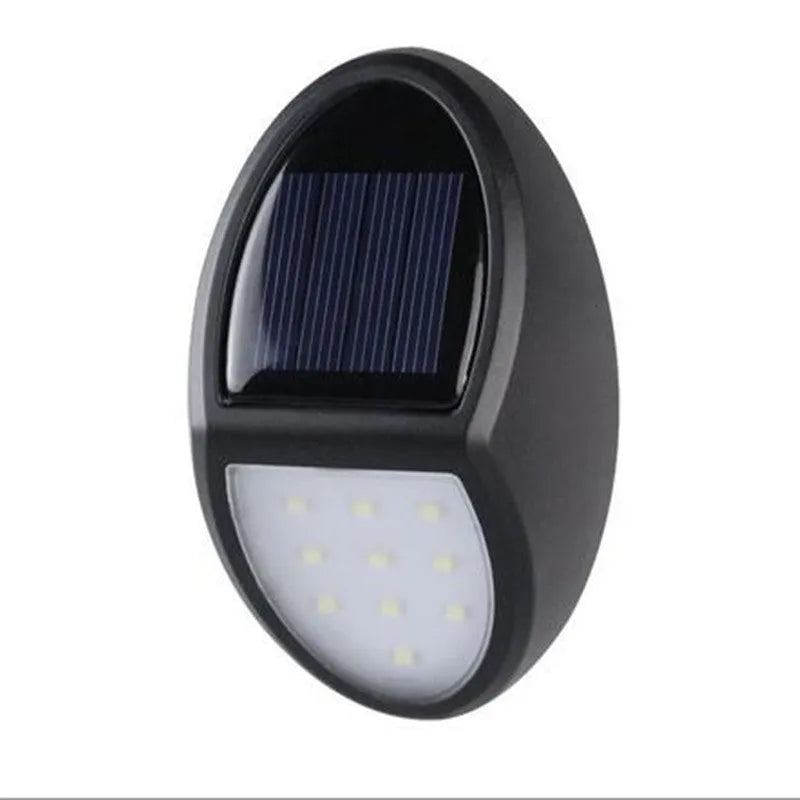 Black rectangular LED solar wall light for outdoor garden or security use