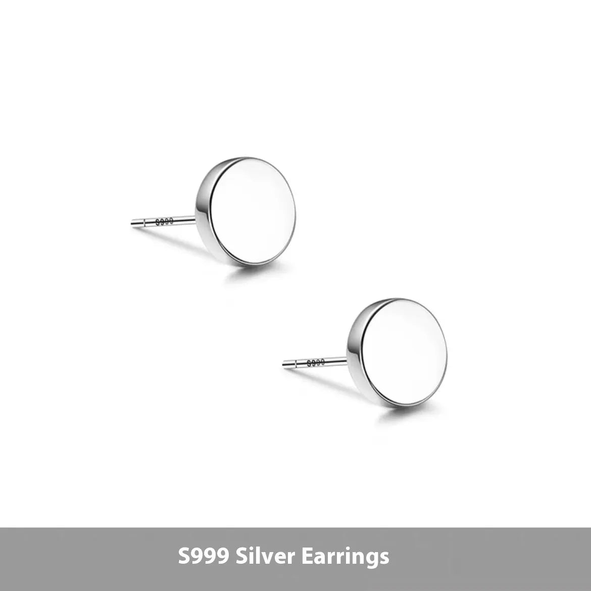 A pair of simple, round, flat-fronted S999 sterling silver ear bone studs on a plain background.