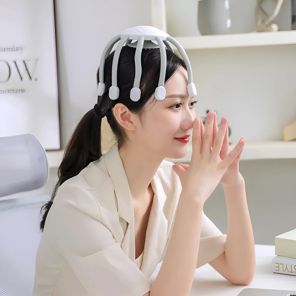 Black USB-powered head massager with multiple claws for scalp vibration and relaxation