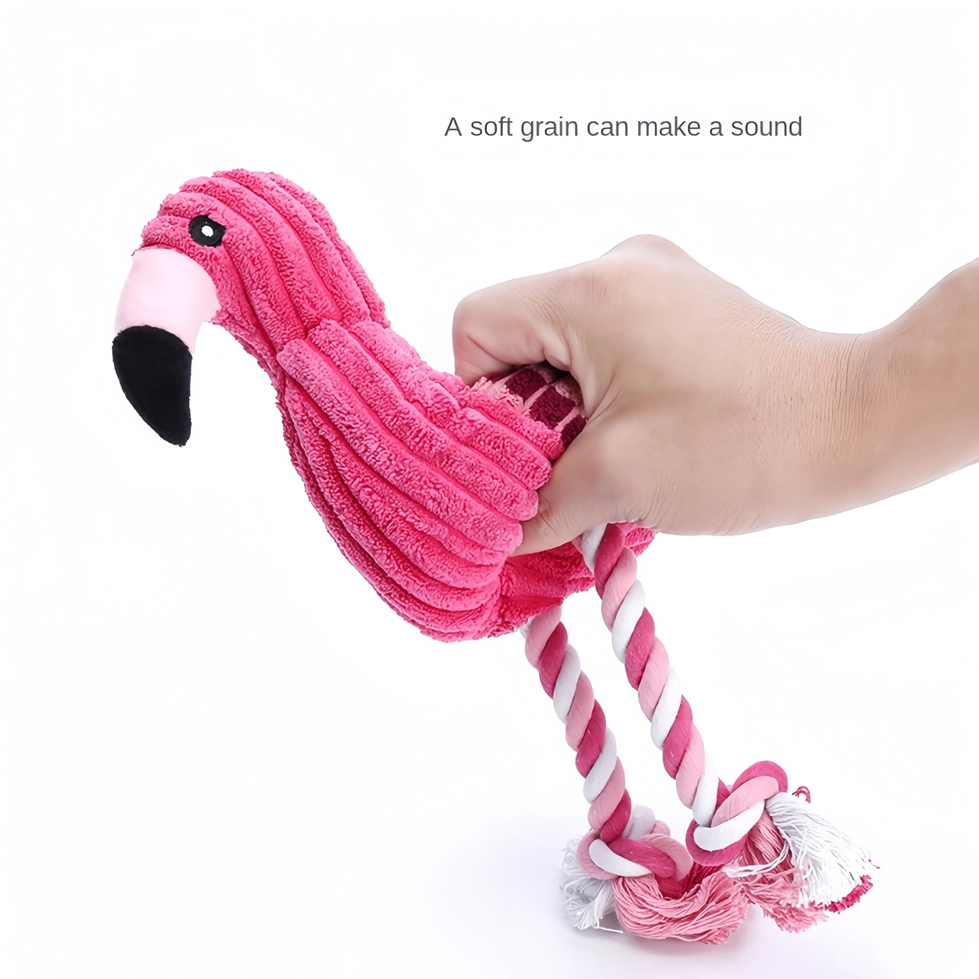 Pink corduroy animal-shaped squeaky plush dog toy on a plain background