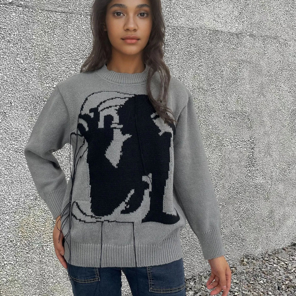Grey alpaca wool women's sweater with tassel detail and abstract pattern