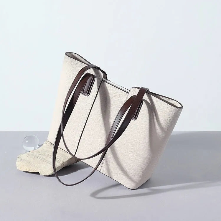 Genuine leather women's shoulder bag in box-type shape with sandwich pocket exterior