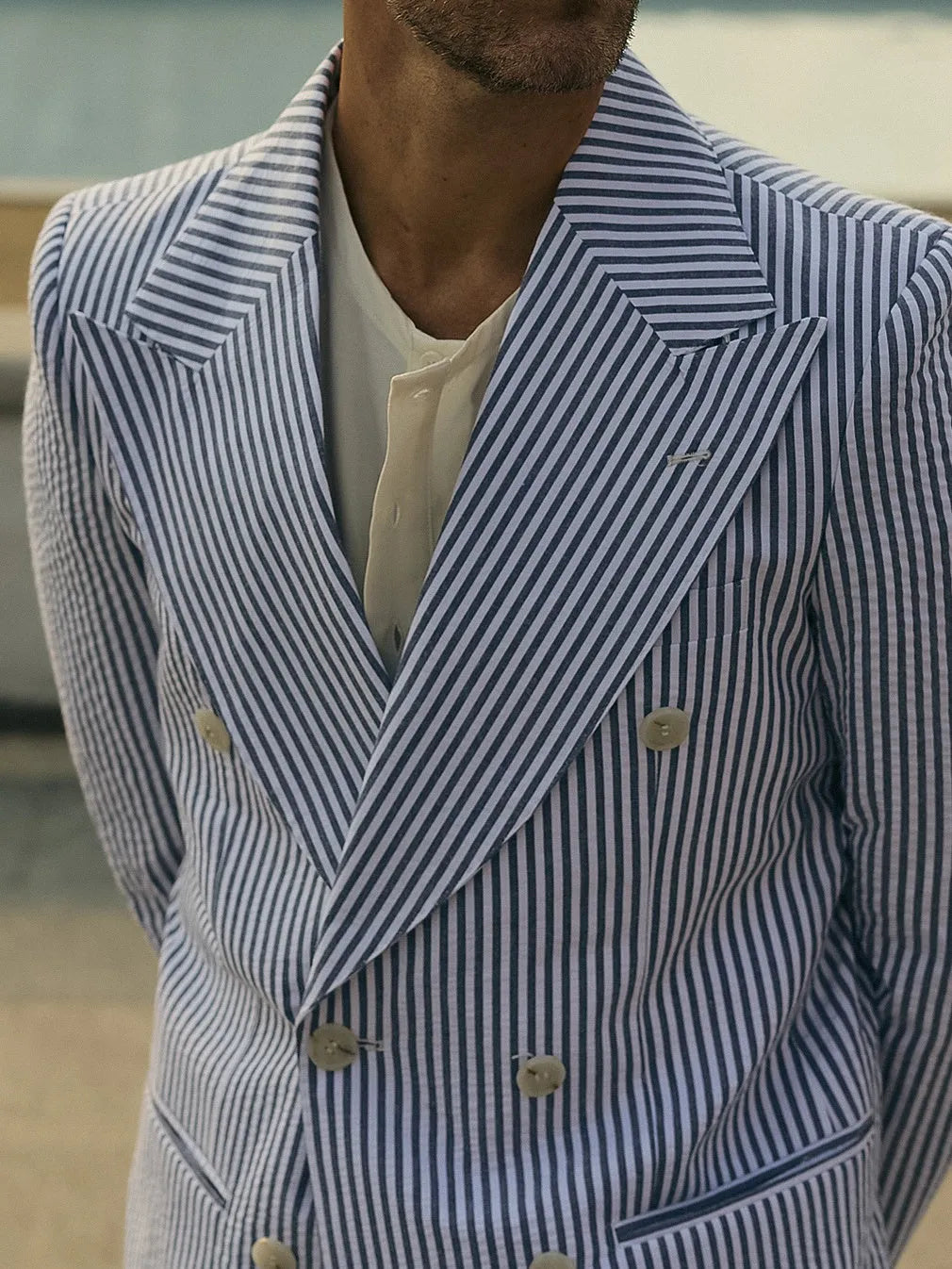 Women's blue and white striped polyester suit set with blazer, trousers and shirt