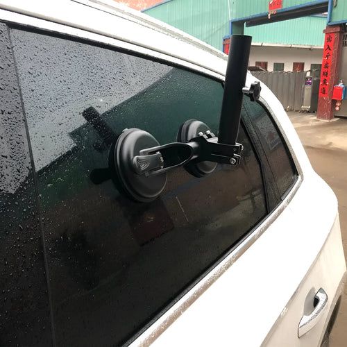 Black ABS and rubber off-road car sucker mount with round glass suction cup.