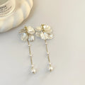 Women's acrylic shell pearl tassel earrings with choice of ear clip types