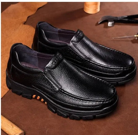 Black cowhide leather slip-on business casual shoes with a rubber sole