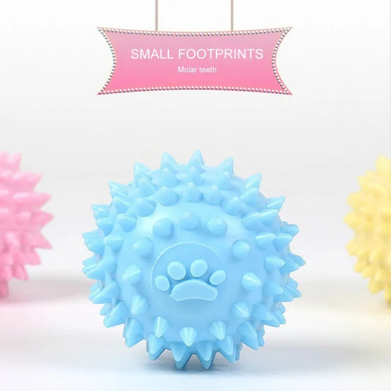 Blue TPR dog chewing toy footprint ball for tooth cleaning, 6cm diameter.