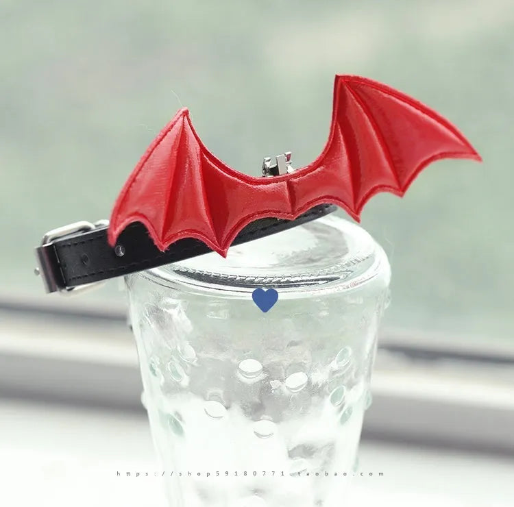 Leather BDSM collar with removable devil wings and bell in patent leather satin