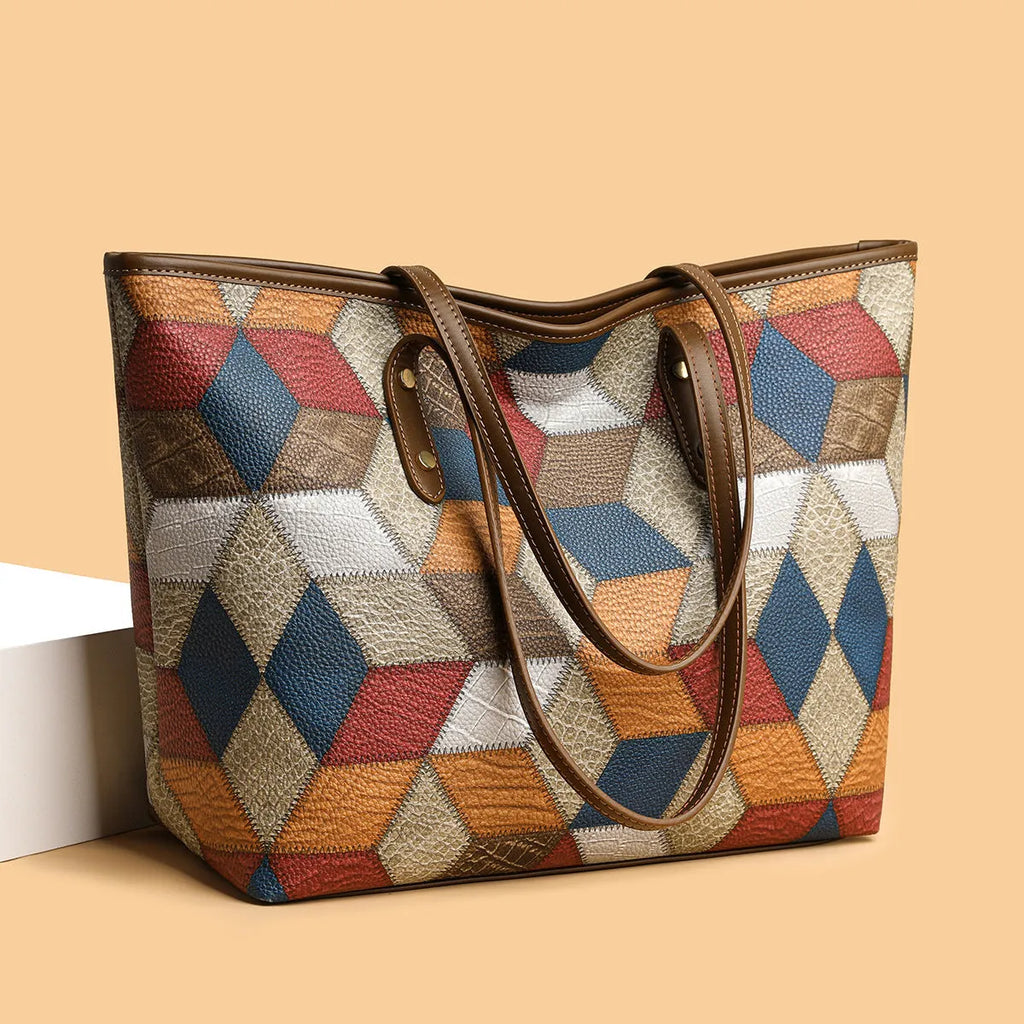 Women's large capacity PVC handbag in blue brown colour with sandwich pocket design for business and leisure use