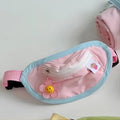 Powder blue pet backpack carrier for small dogs and cats with messenger bag styling