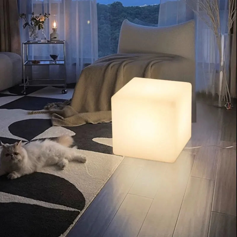 Modern square LED cube light for outdoor garden and patio use with waterproof IP65 rating.