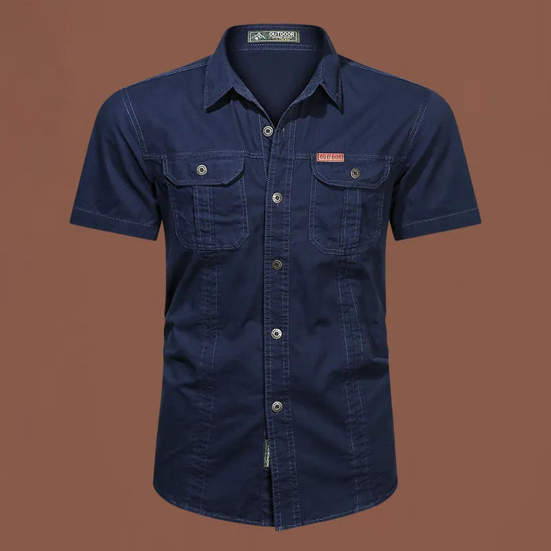 Men's loose fit cotton short sleeve work shirt in cardigan style on a hanger