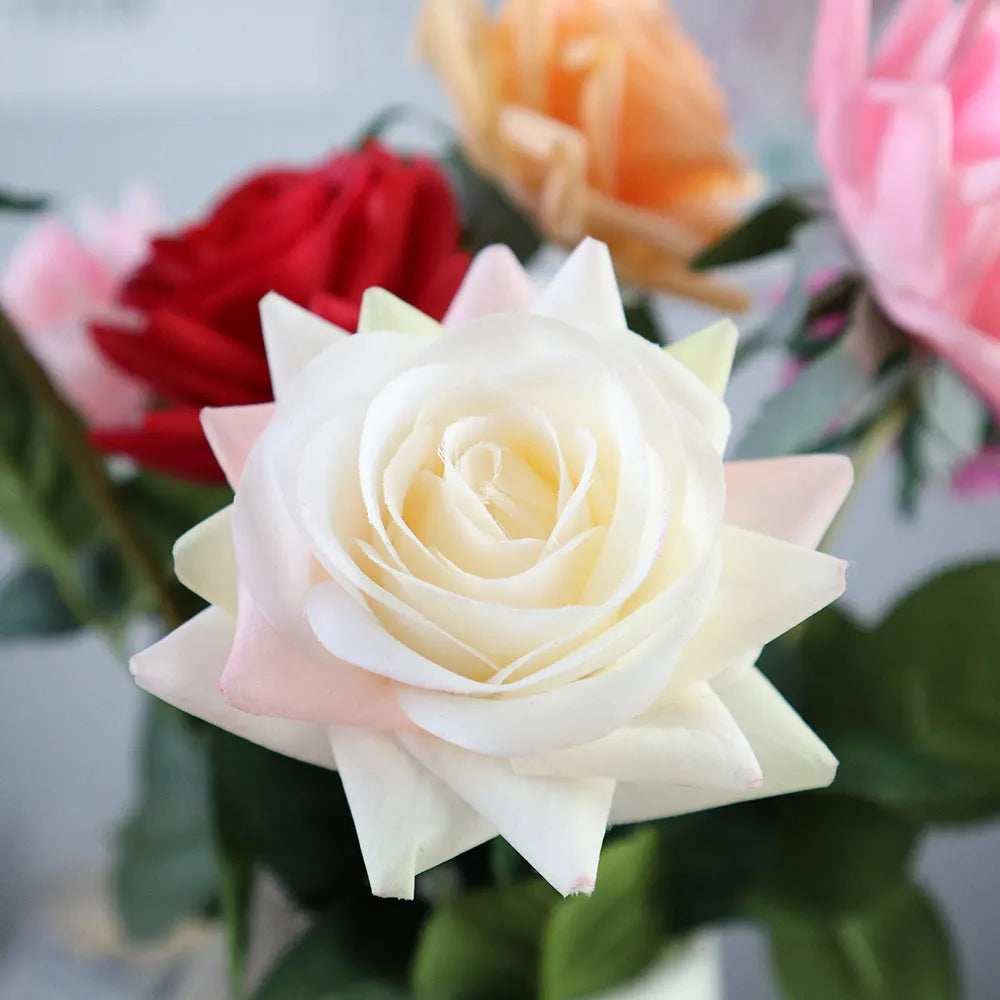 Silk artificial rose bouquet with 8.5cm flower heads in red, orange, white or purple fringe pink colours