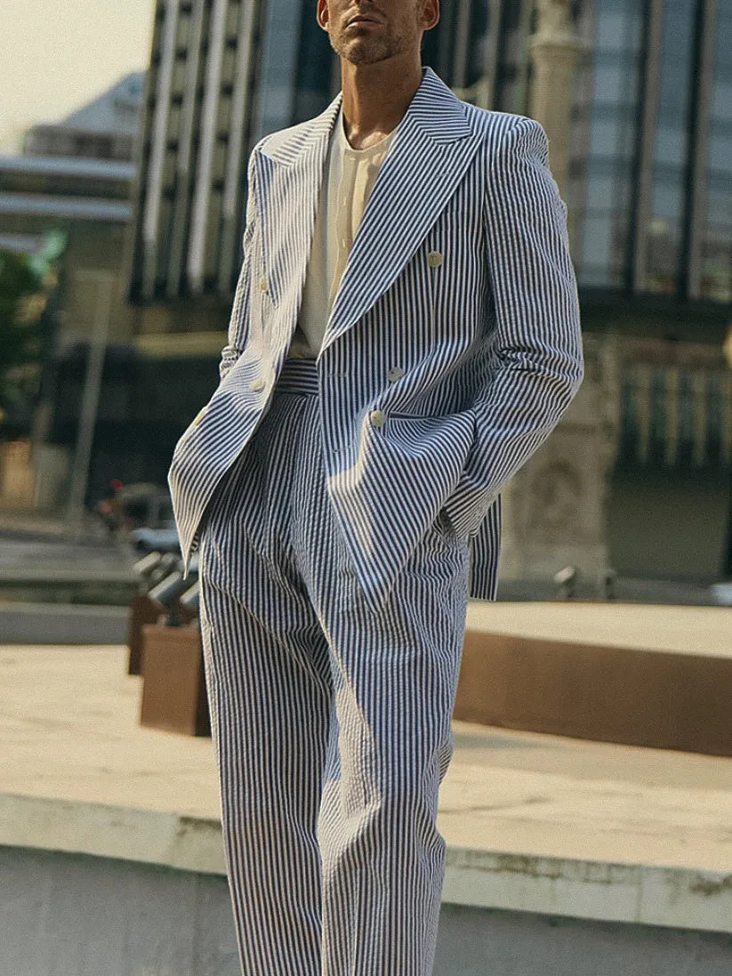 Women's blue and white striped polyester suit set with blazer, trousers and shirt