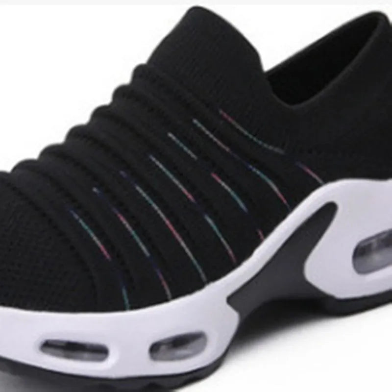 Plus size women's and men's stretch knit sock shoes in dark blue with fly-knit mesh upper.