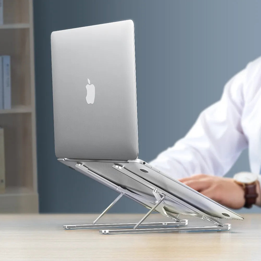 Foldable aluminium laptop stand in silver, shown open in use and closed for storage.