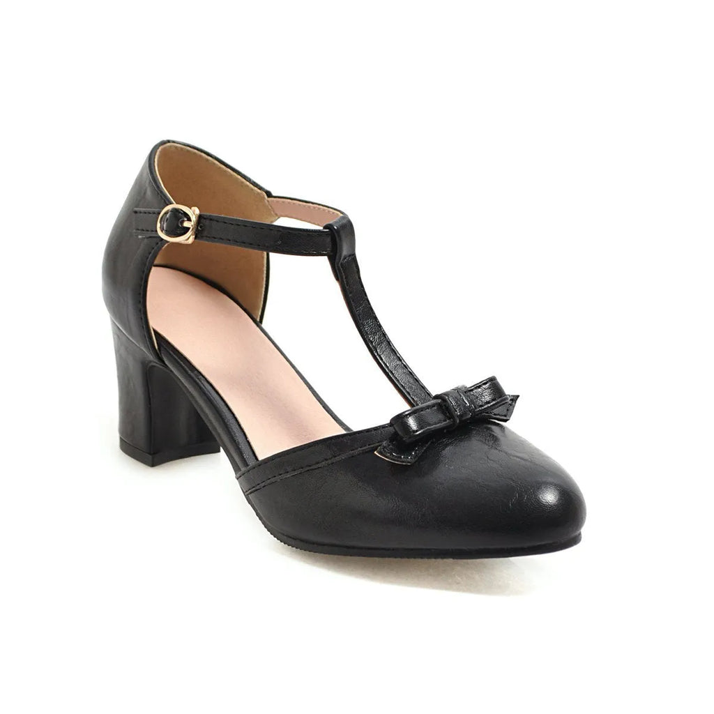 Women's apricot colour sandals with bow tie detail, chunky 6.5cm block heel, and adjustable buckle strap