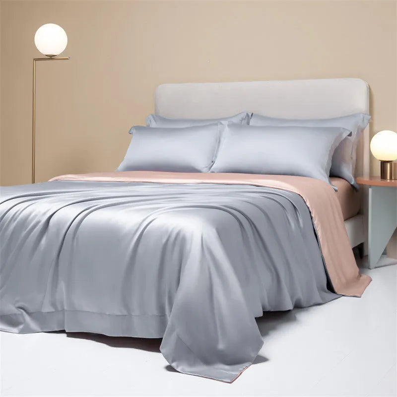 Lenzing Tencel 200 thread count bedding set in satin weave showing Aurora Blue quilt cover and pillowcases