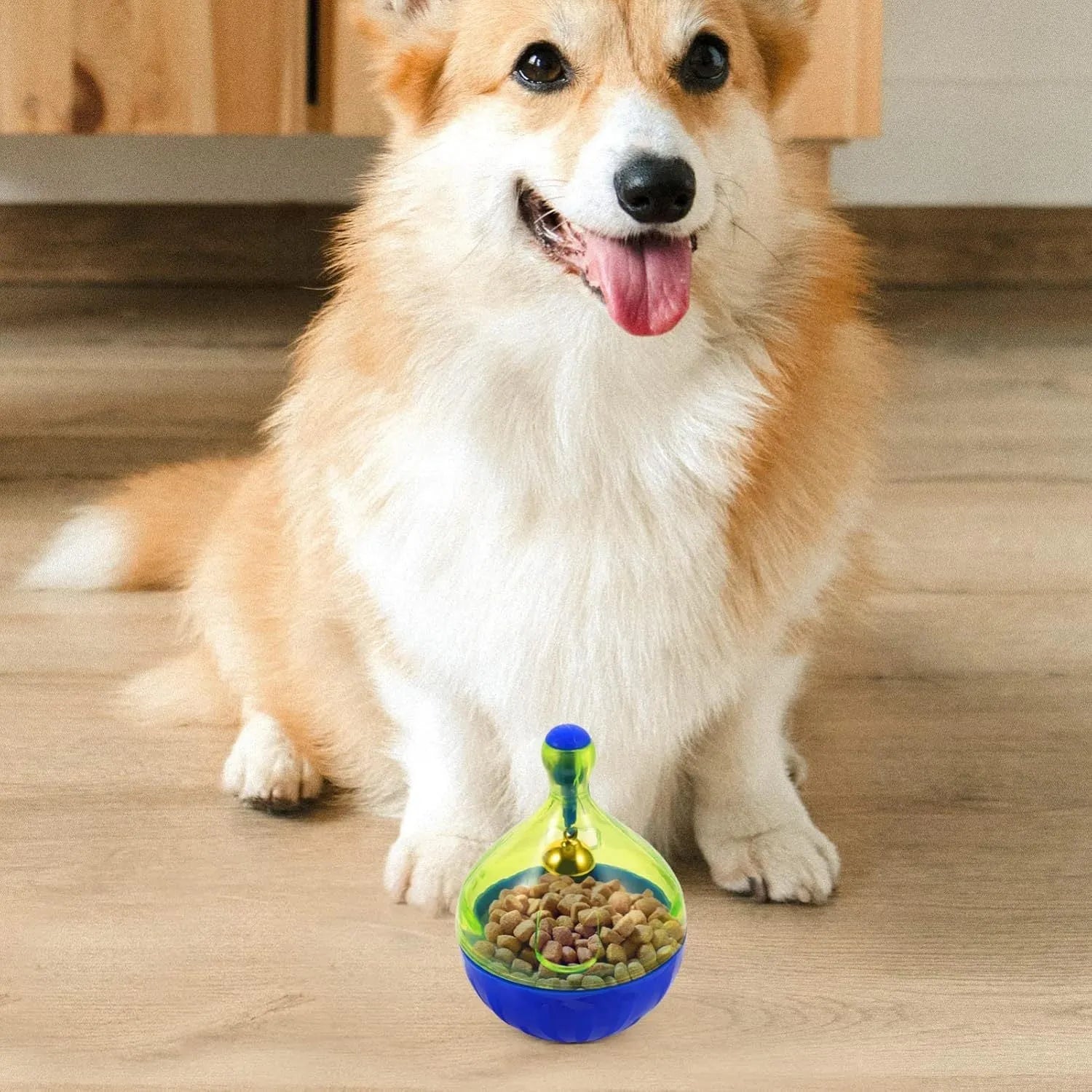 L-size interactive pet treat dispenser ball for dogs and cats, showing tumbler design with treat openings.