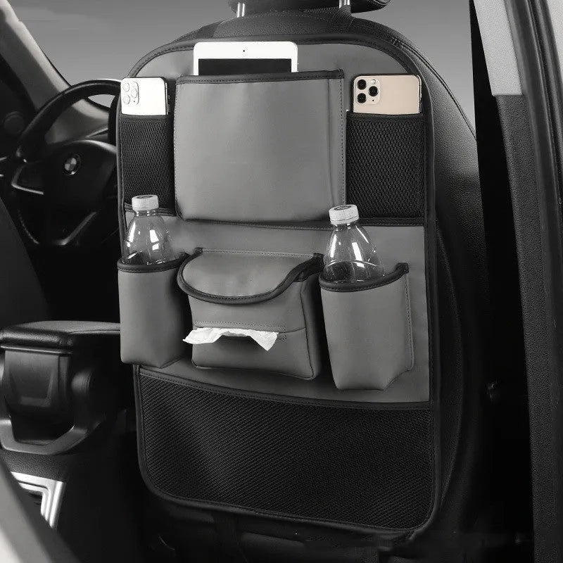 Leather car seat back storage bag in choice of four colours mounted behind vehicle seat