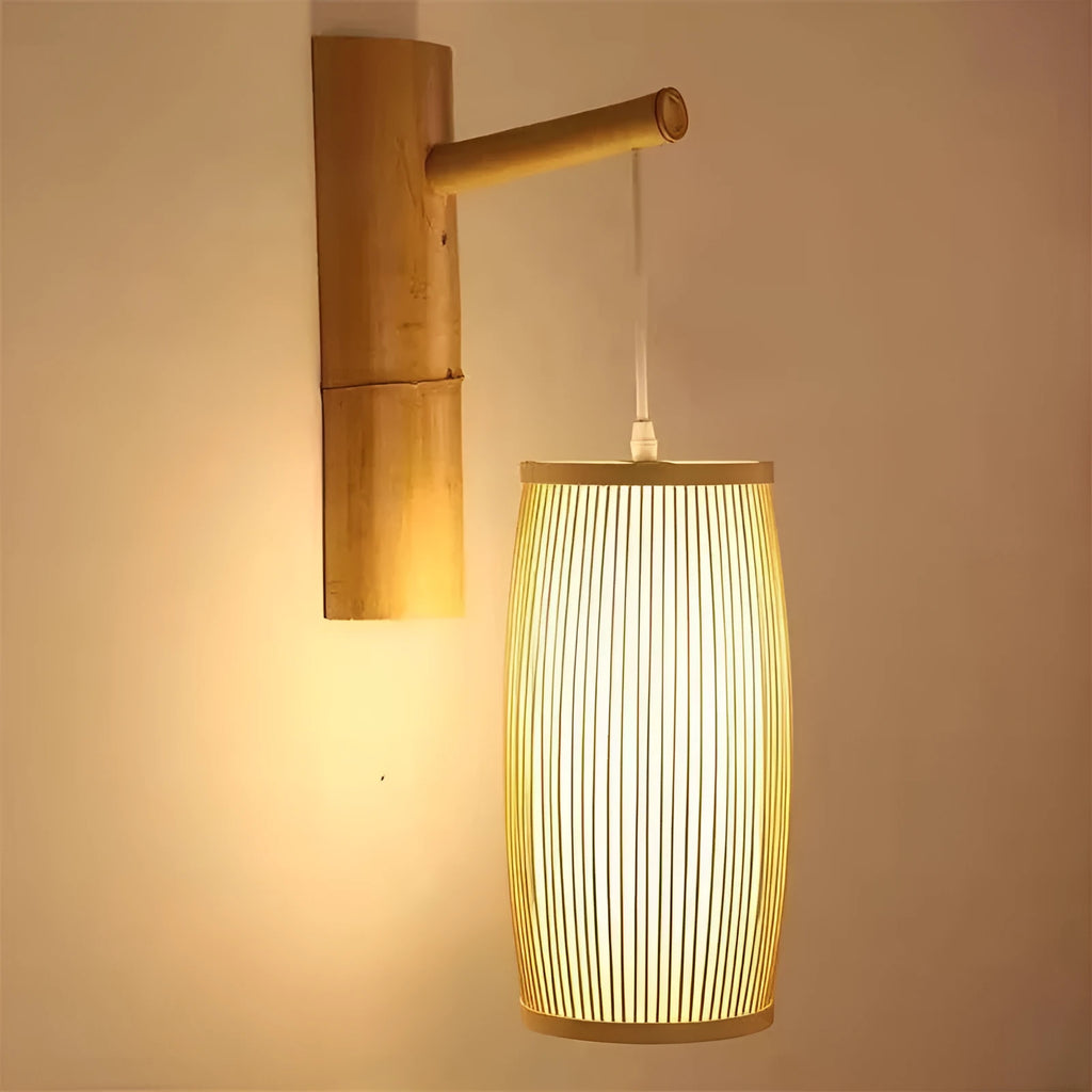 Close-up of a woven bamboo pendant light with a white E27 lamp holder, showing its natural texture and compact size.