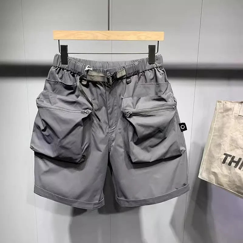 Men's black loose fitting work shorts with multiple pockets and straight leg hem