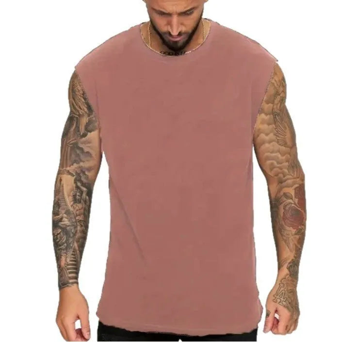 Men's loose cotton tank top in solid colours showing sleeveless design and straight hem
