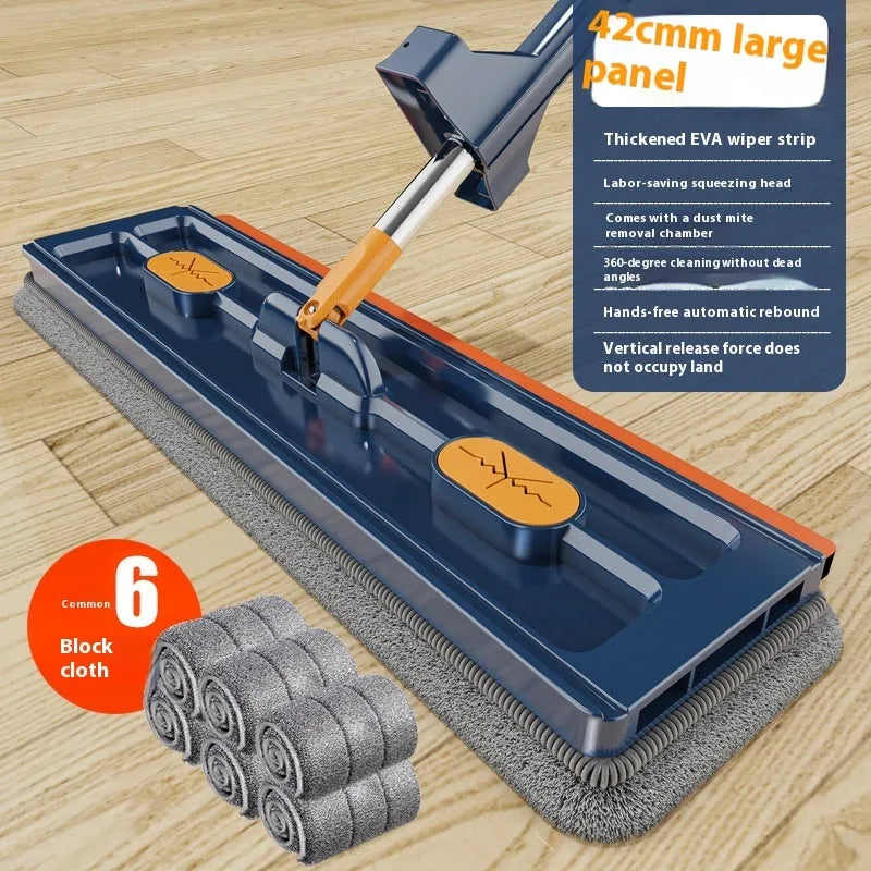 Large flat mop with long stainless steel handle and blue cleaning cloth on a hard floor.