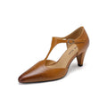 Brown retro women's sandals with a T-strap buckle, closed round toe, and a stout high heel.