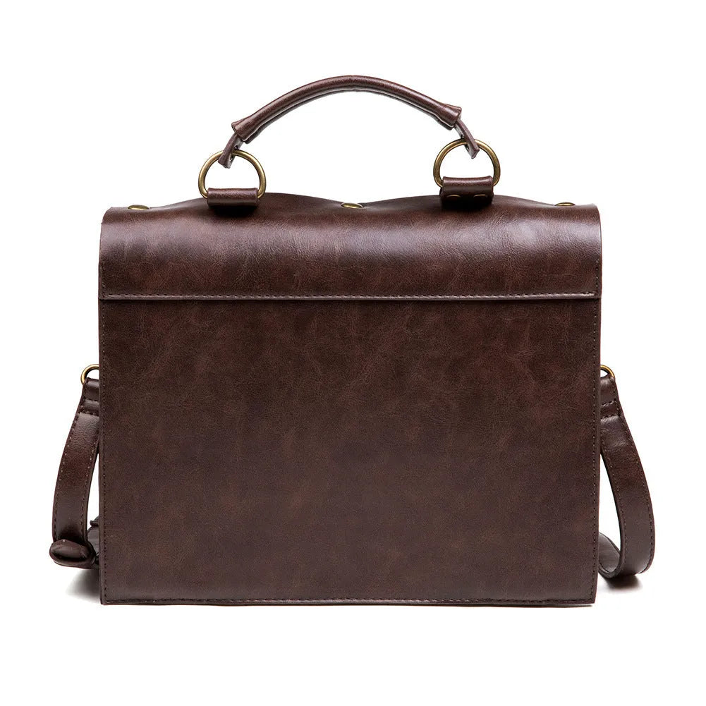 Bronze steampunk industrial retro style shoulder bag with metal details and pillow shape.