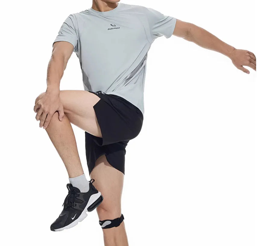 Black and blue four-point stretch running shorts with laser-cut stitching detail on a mannequin.