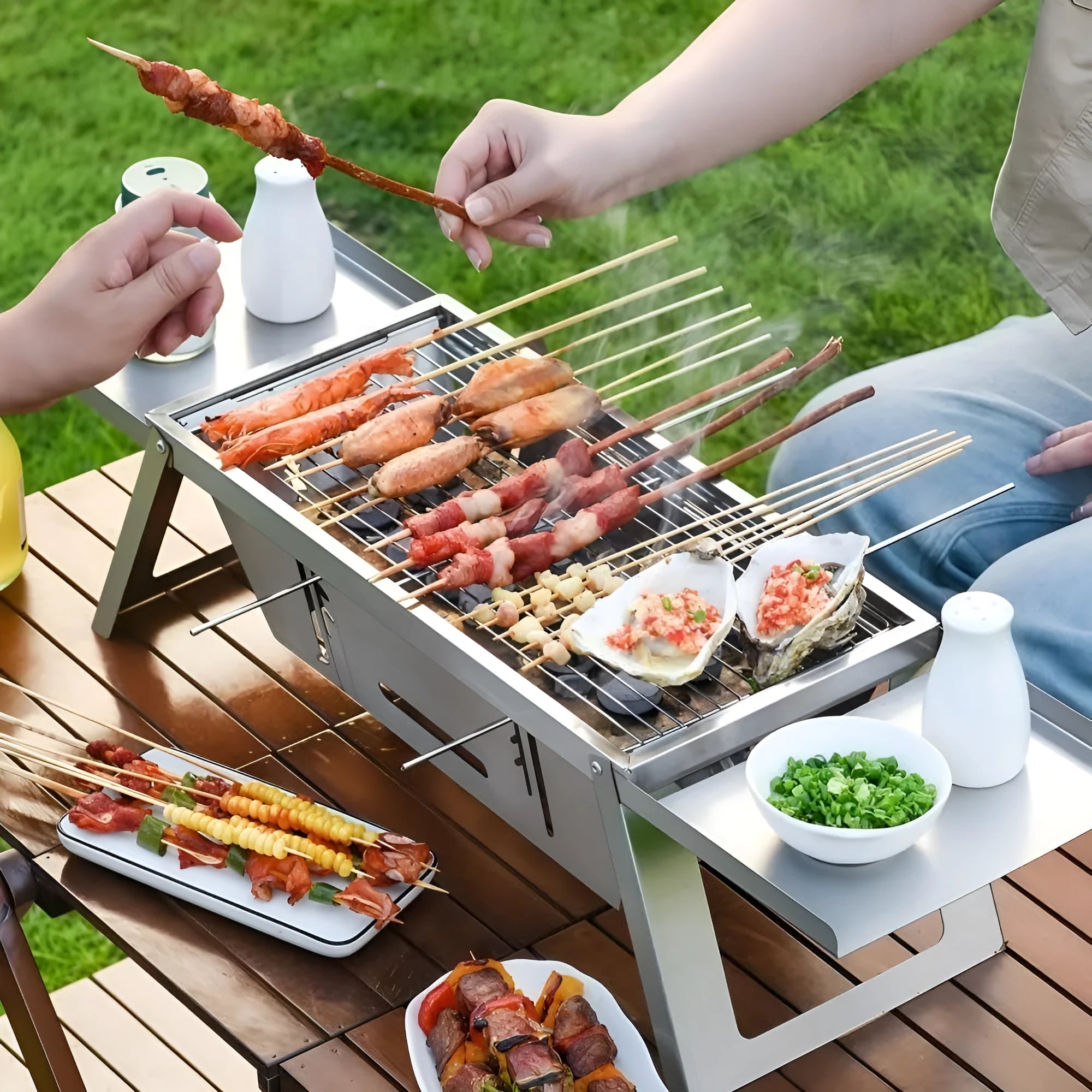 Small portable charcoal grill shown in a folded position for compact storage.