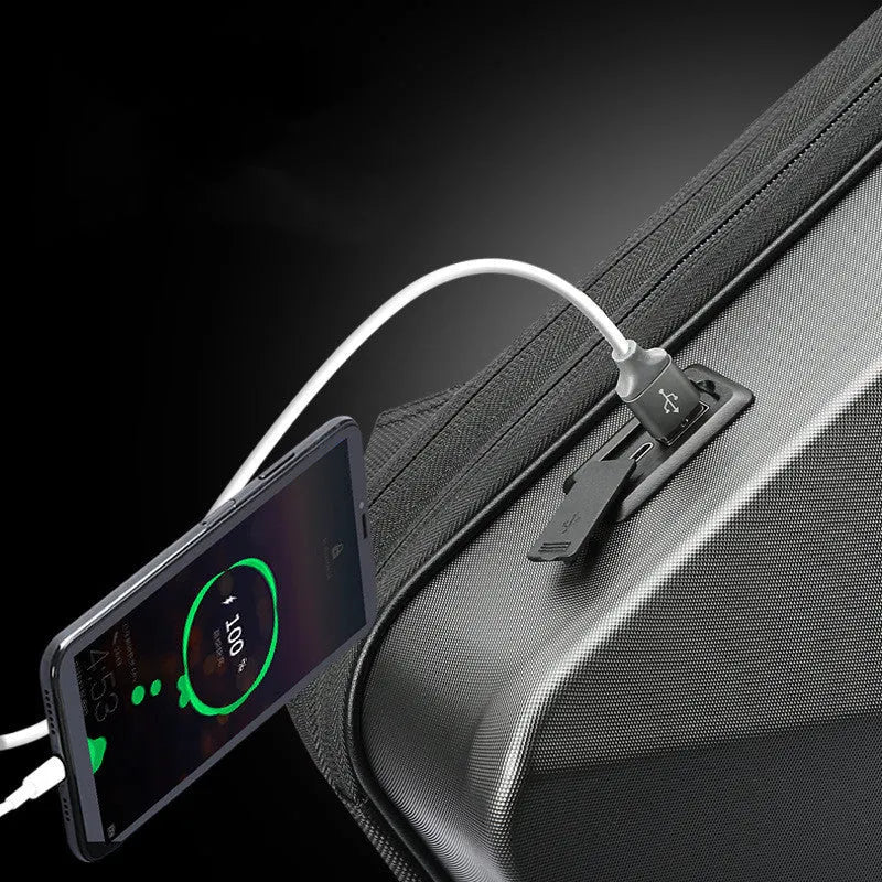 Hard shell gaming backpack in black or silver colour with multiple compartments and lock opening system