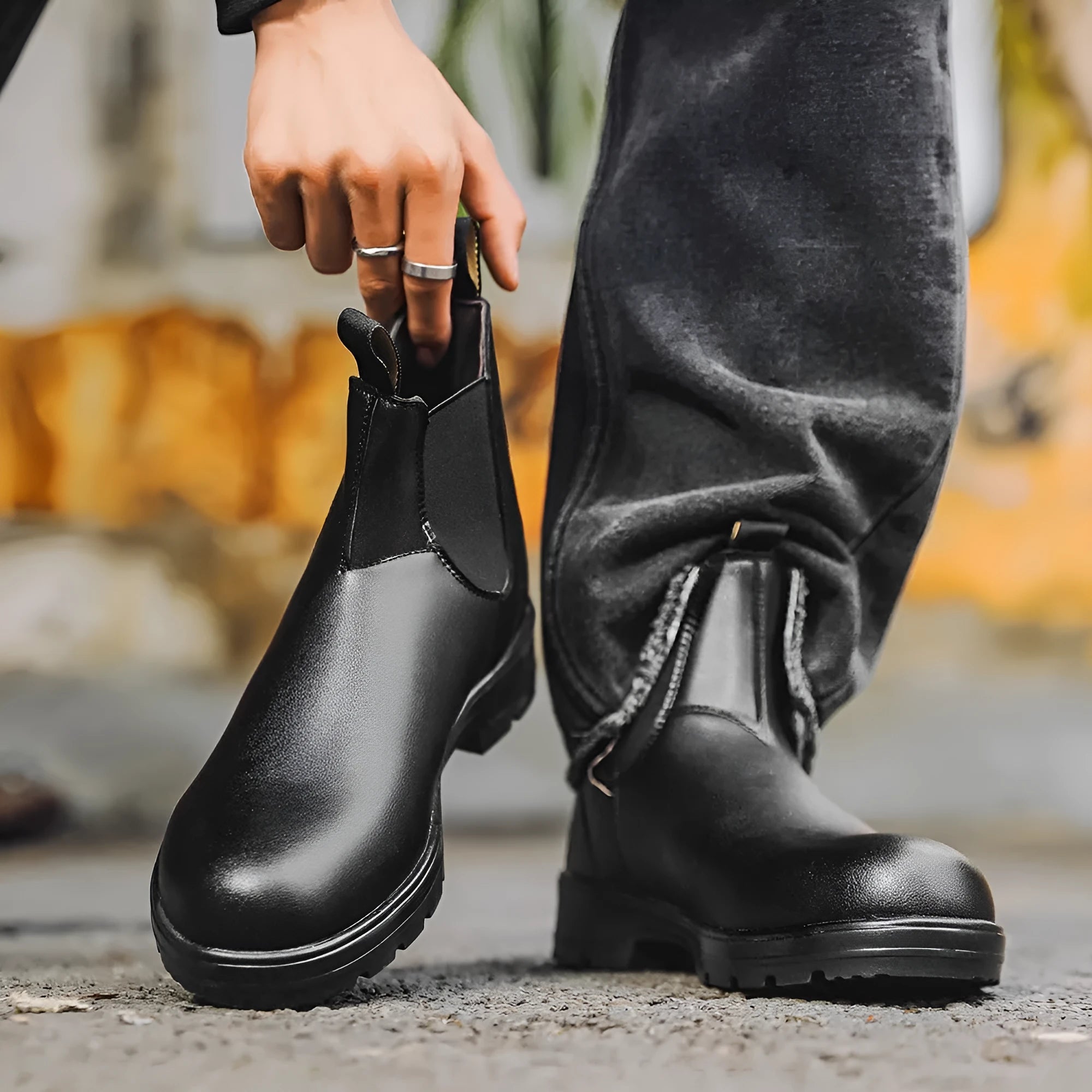 Unisex vintage brown Chelsea boots with a chunky sole and round toe on a white background