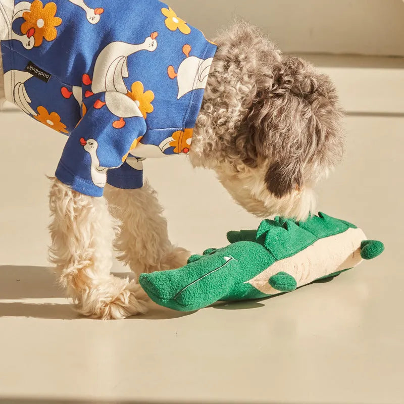 Green plush toy dog soft animal companion measuring 35cm by 18cm
