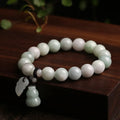 Natural jade geometric bracelet with hanging charm showing Apple design option