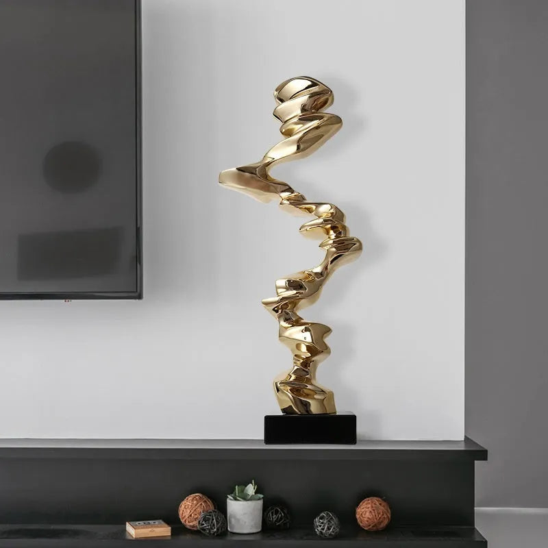 Modern abstract resin sculpture decoration in Ran Ran Rose gold, silver, or blue.