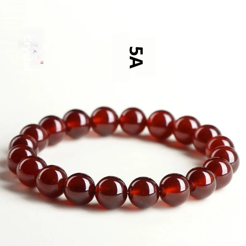 Natural orange red garnet crystal bracelet with Ruyi decorative elements in retro ball design