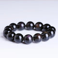 A geometric polished crystal bracelet featuring a Pi Xiu charm on a beaded strand.