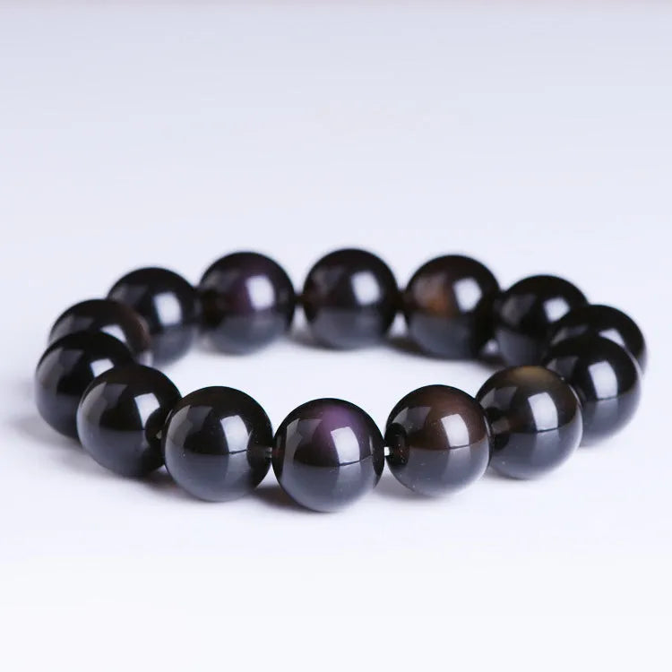 A geometric polished crystal bracelet featuring a Pi Xiu charm on a beaded strand.