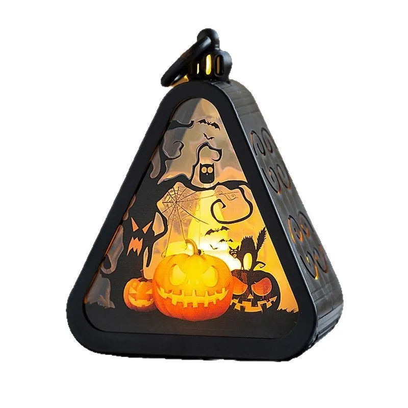 Portable Halloween pumpkin lamp decoration in four colours measuring 8.9 by 5.2 by 11.5 centimetres