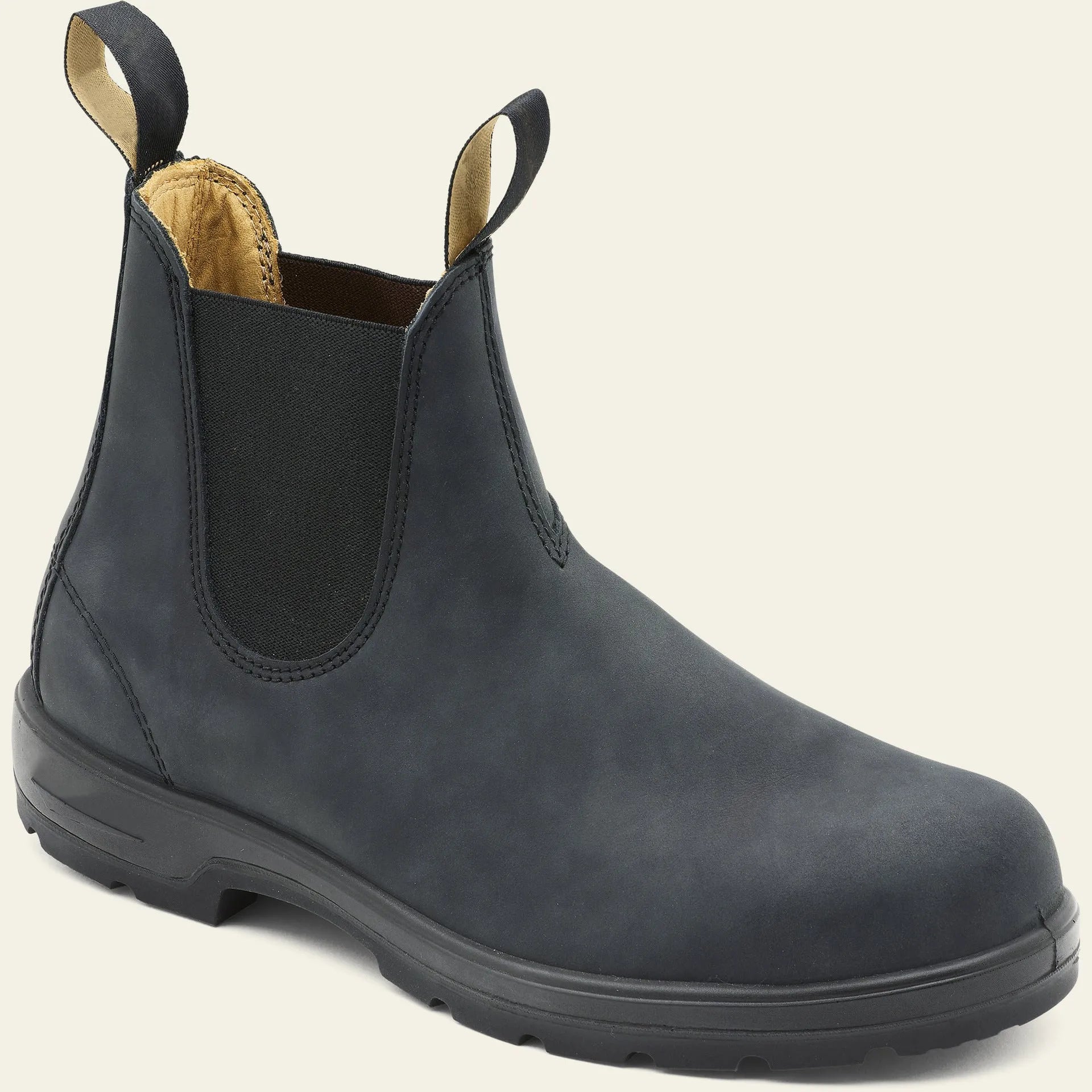 Unisex vintage brown Chelsea boots with a chunky sole and round toe on a white background
