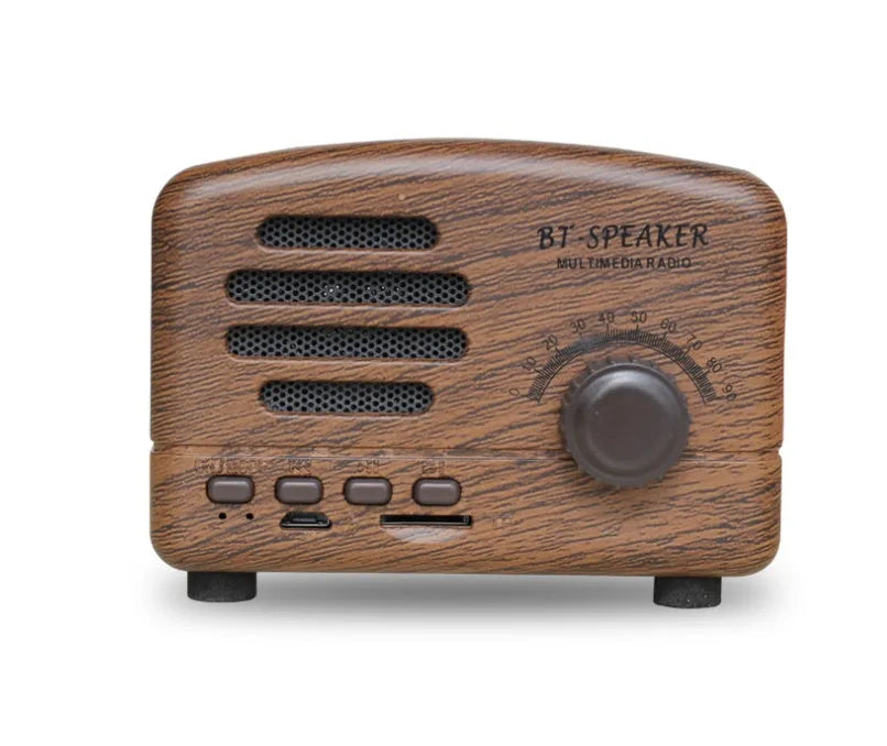 Vintage wood Bluetooth speaker in pink, black, and wood grain colours showing compact 93x70x59mm dimensions