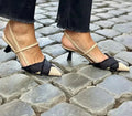 Women's apricot black colour block pointed sandals with stiletto heels and buckle fastening.