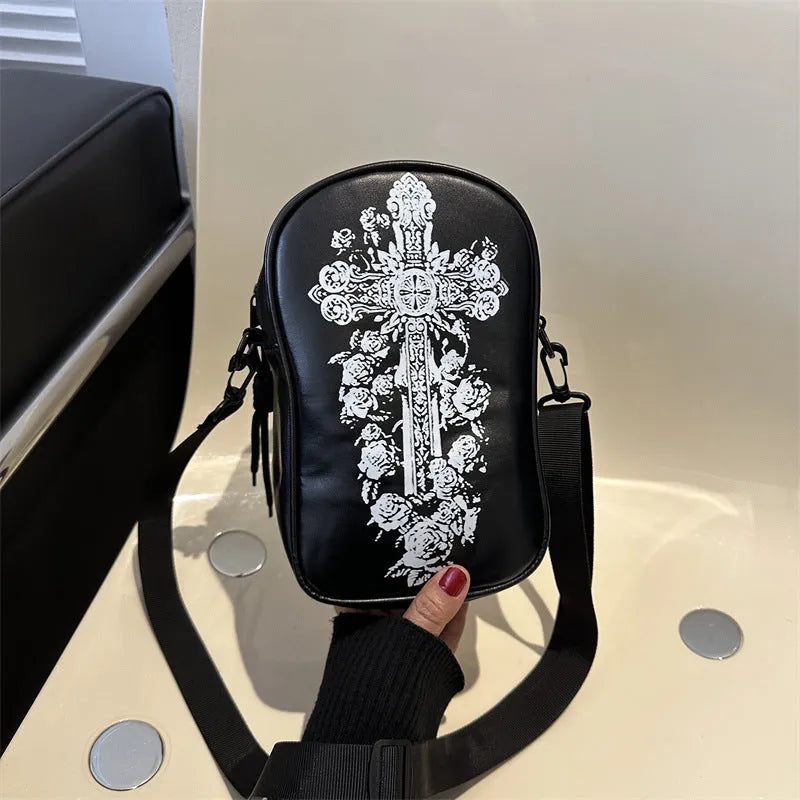 Halloween graffiti print crossbody bag showing pumpkin, ghost and bat designs in medium 14x23x9.5cm size