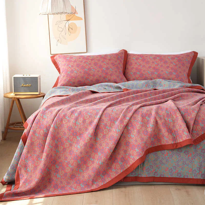 Cotton gauze bed blanket set with floral botanical pattern and two matching pillowcases