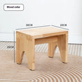 Solid wood shoes changing stool with distressed finish and bracket leg structure.