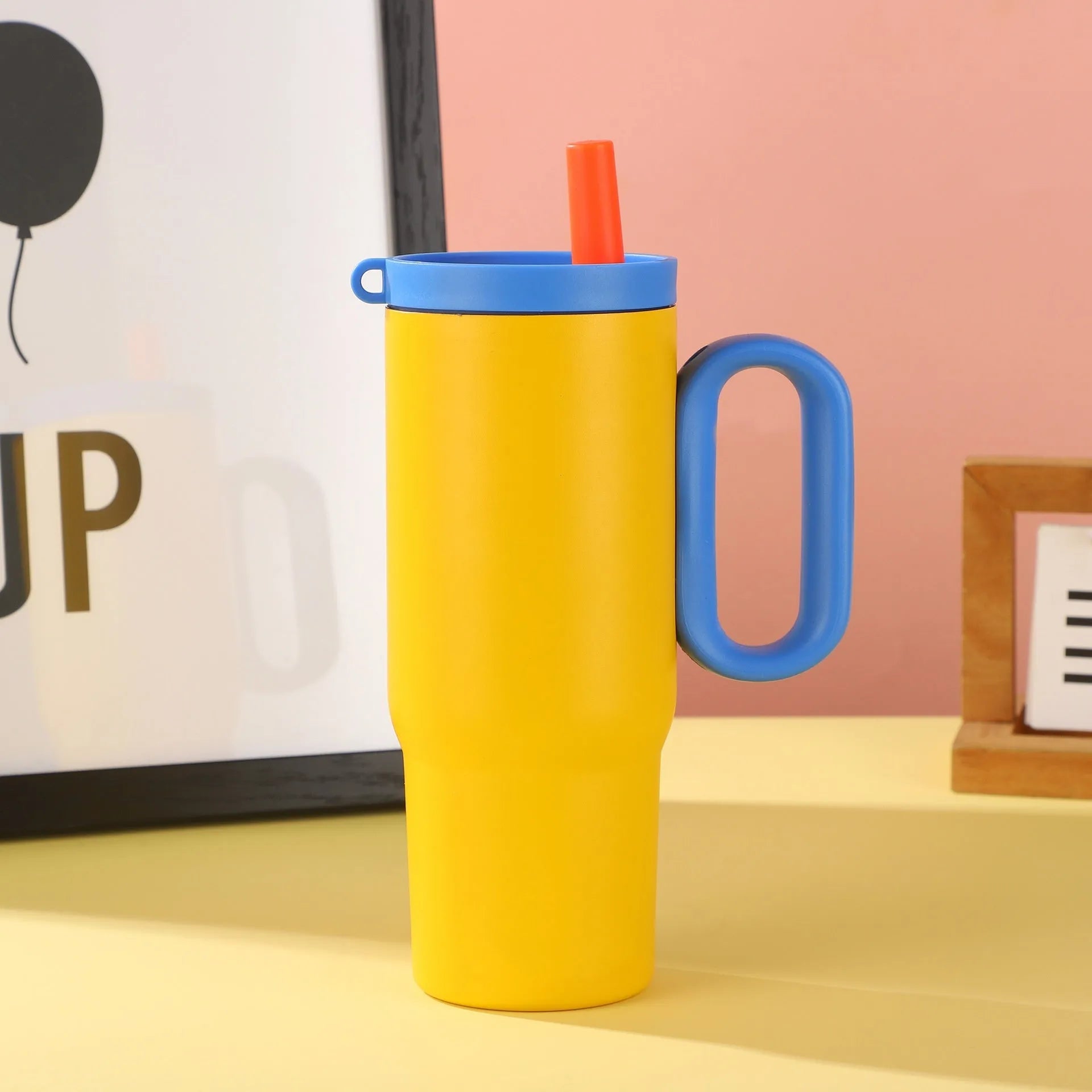 Large stainless steel insulated straw cup with handle in multiple colour options.
