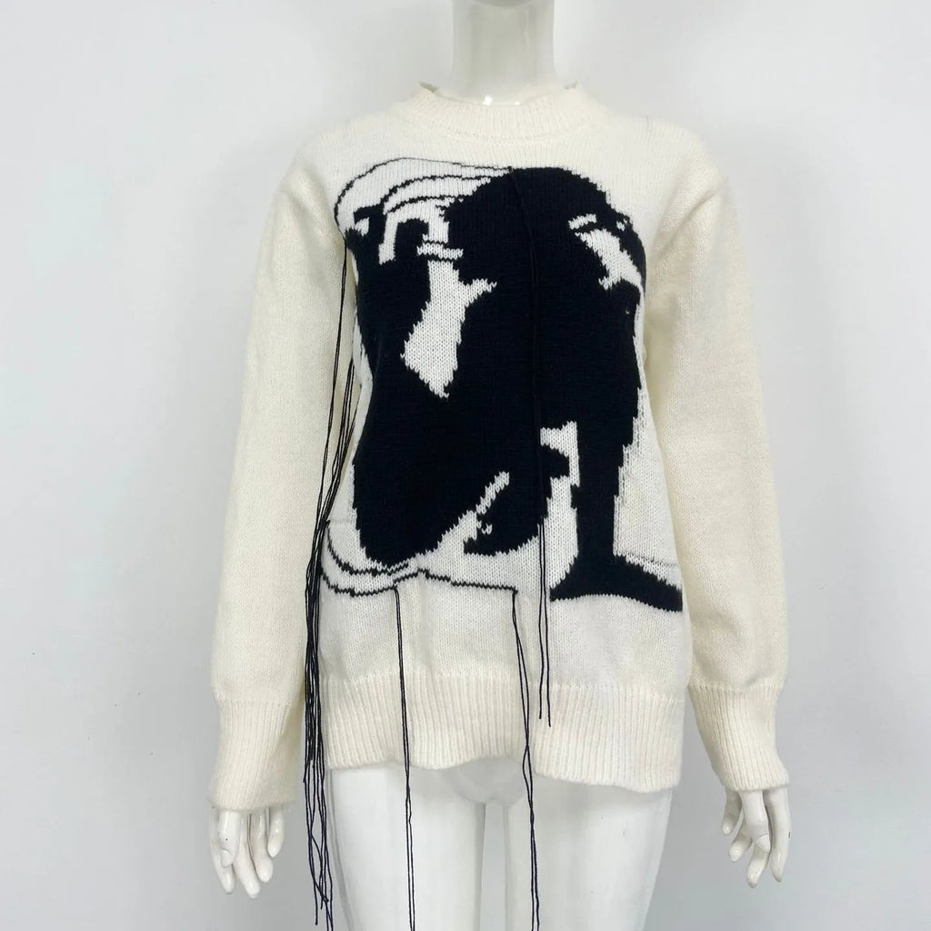 Grey alpaca wool women's sweater with tassel detail and abstract pattern