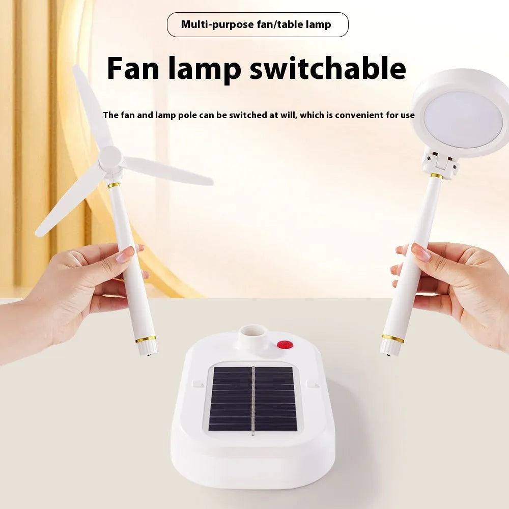 Ivory white solar powered table fan with integrated LED study lamp on desktop